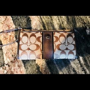 Coach brown signature wristlet